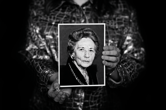 Portrait of Beate Anson (1918-2008) with the hands of granddaughter Gillian Galante, 2021. Digital photograph. Courtesy of Here to Tell: Faces of Holocaust Survivors. Photo: Marnie Jazwicki.